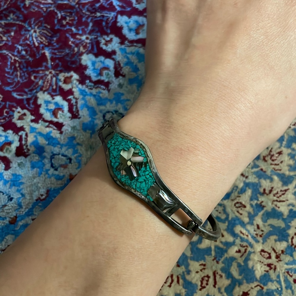 Tarnished silver bangle, crushed turquoise and mother of pearl inlay